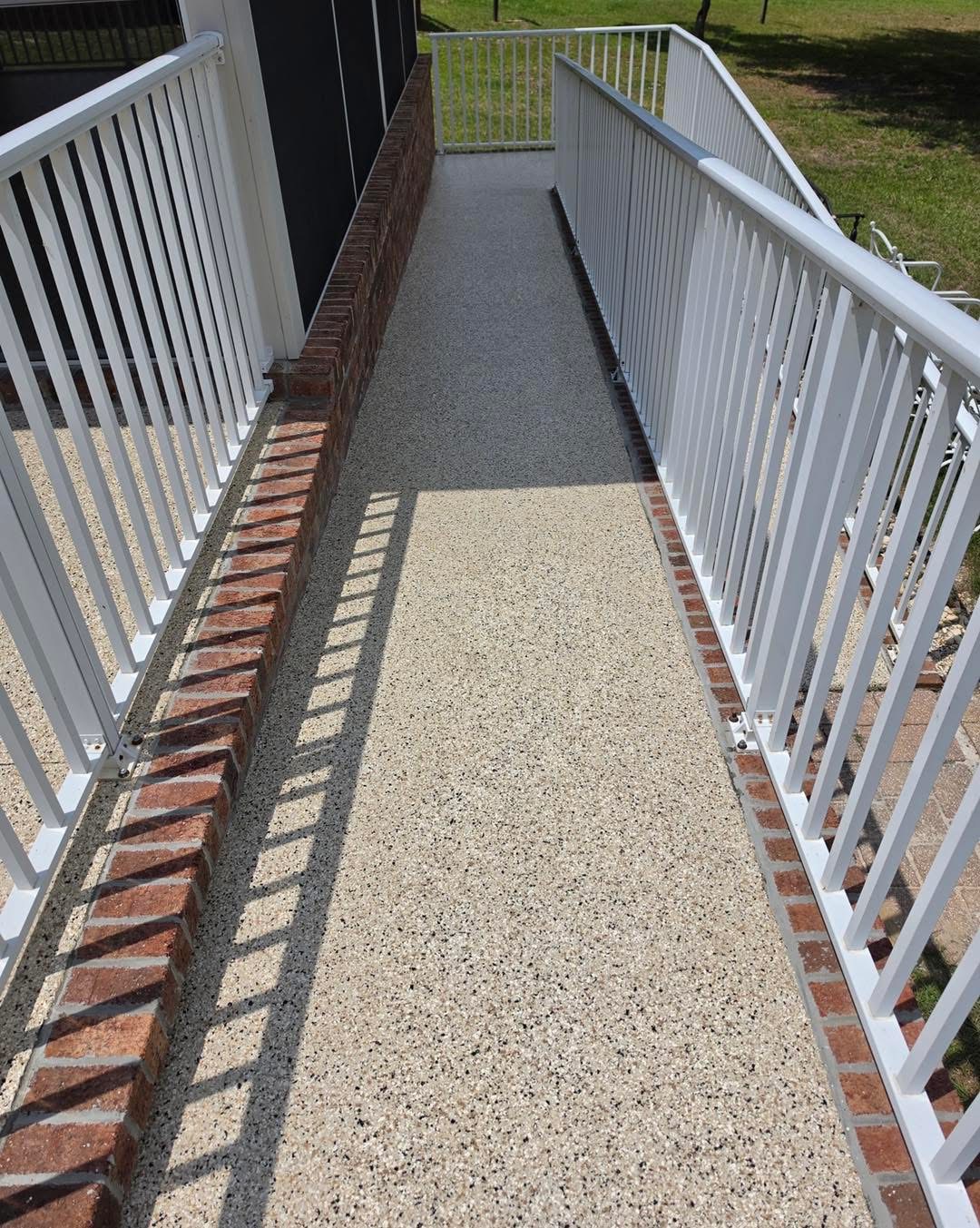 After: uniform flake coating on the same walkway seen from above