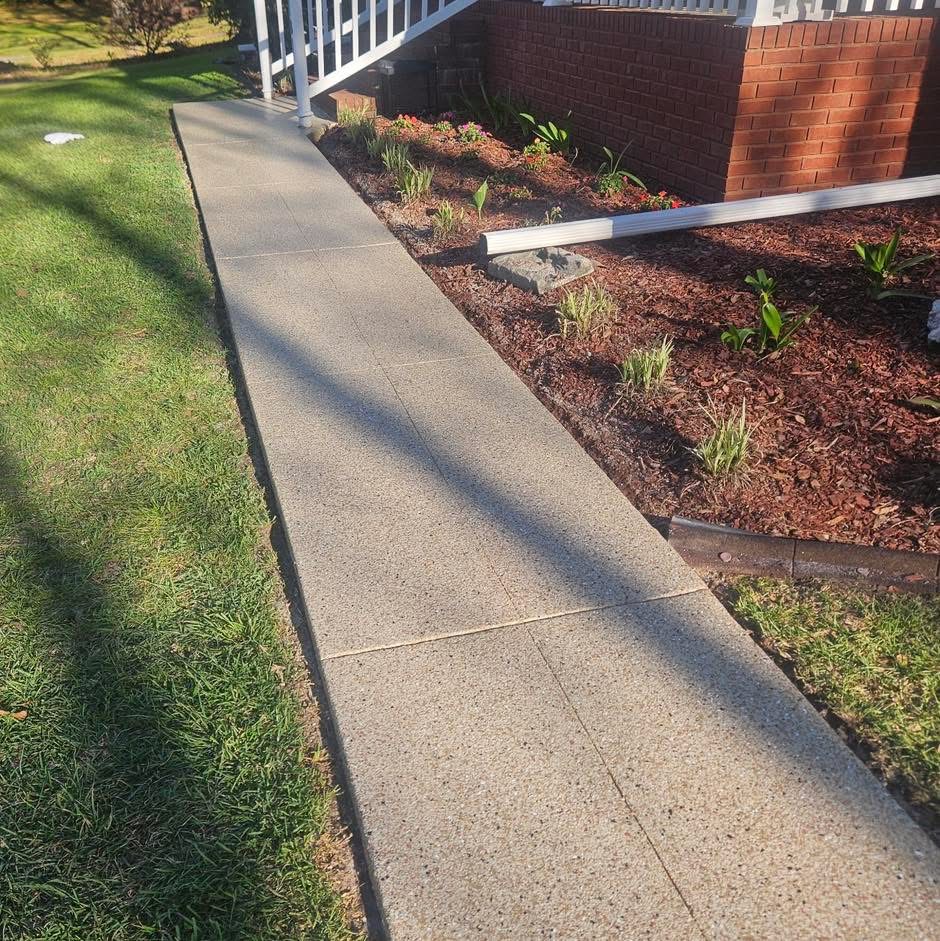 After: tan and gray flake coating on the same walkway