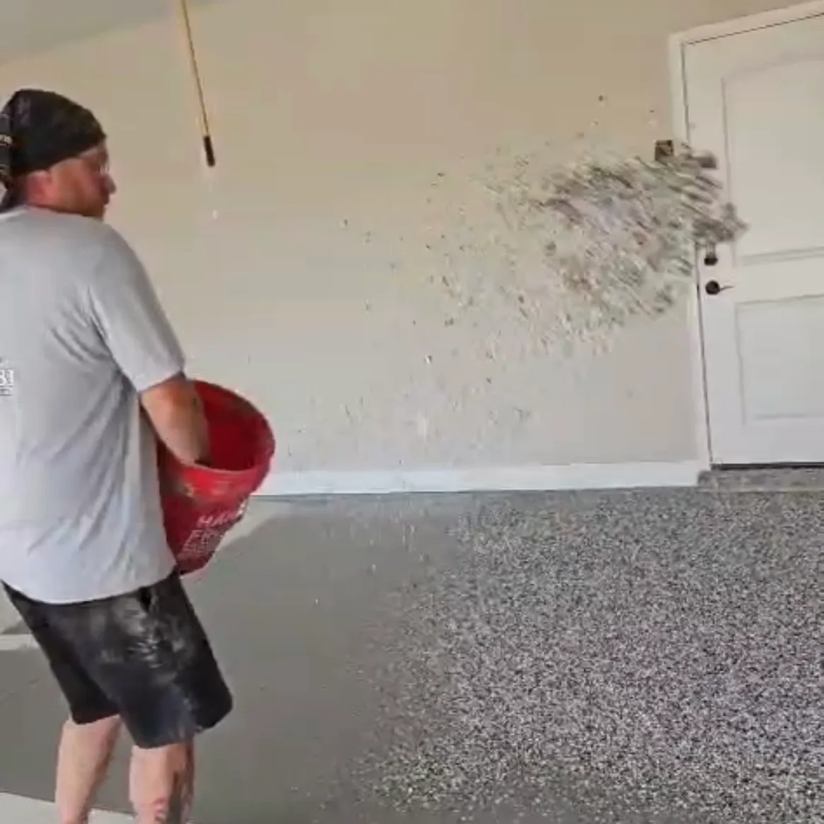 Hand-broadcasting flake into the wet basecoat
